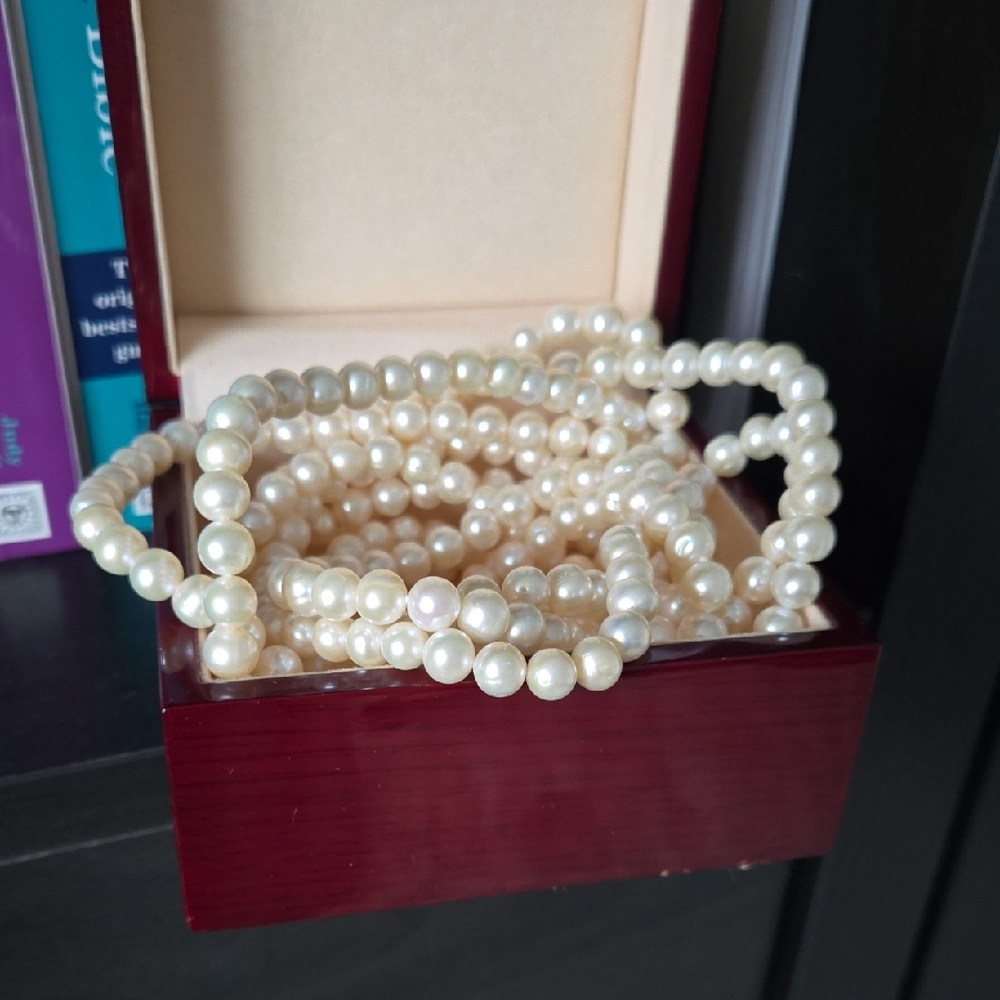 Long Strand Of Pearls